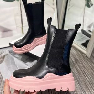Stylish women boots pink & black